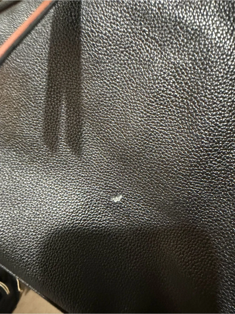 Sleek Black Leather Shoulder Bag with Brown Strap